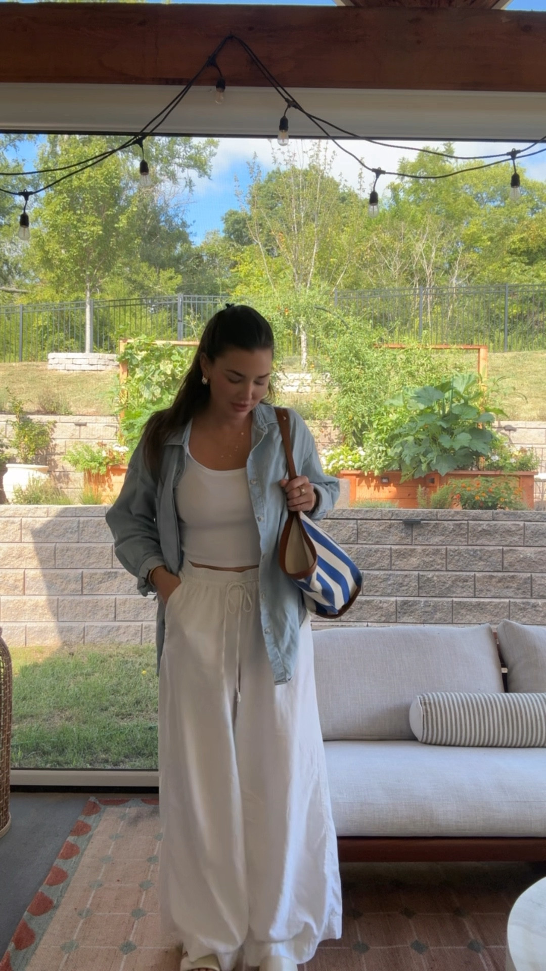 Aritzia denim button down back in stock 🤩 closet staple yall know i love a good staple lol I’m in a Large for extra oversized 

#LTKSaleAlert #LTKStyleTip #LTKFindsUnder50