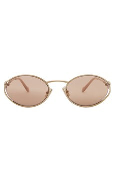 Miu Miu Oval Sunglasses in Pale Gold from Revolve.com | Revolve Clothing (Global)