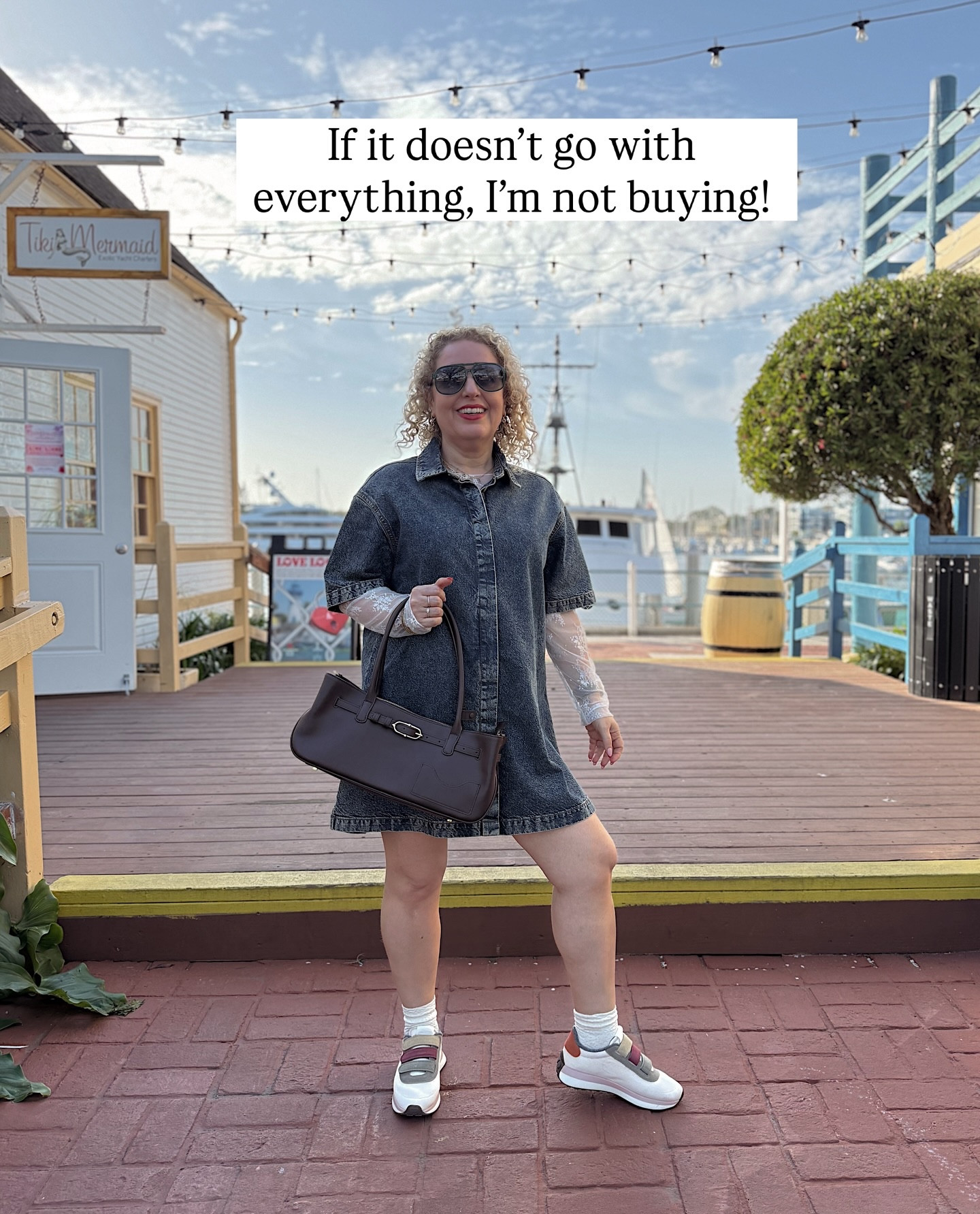 This is my kind of everyday outfit: comfy, pulled together, and easy to rewear.

A @asos denim shirt dress is one of those pieces I reach for when I don’t want to think but still want to look styled. I layered it with sheer sleeves for texture, added socks + @allbirds varsity sneakers for walking all day, and finished it with a @oleada_official structured bag to make it feel more “outfit” and less just casual.

I’m trying to buy less, but when I do buy, it has to work with most of my closet. These shoes and this bag instantly upgrade basics I already own which means they’ll actually get worn.

This is my rule lately:
👉 If it doesn’t go with everything, I’m not buying it.

Would you wear this for errands, coffee, or casual meetings?
Save this for outfit inspo + comment for links 🤍

#everydayoutfit