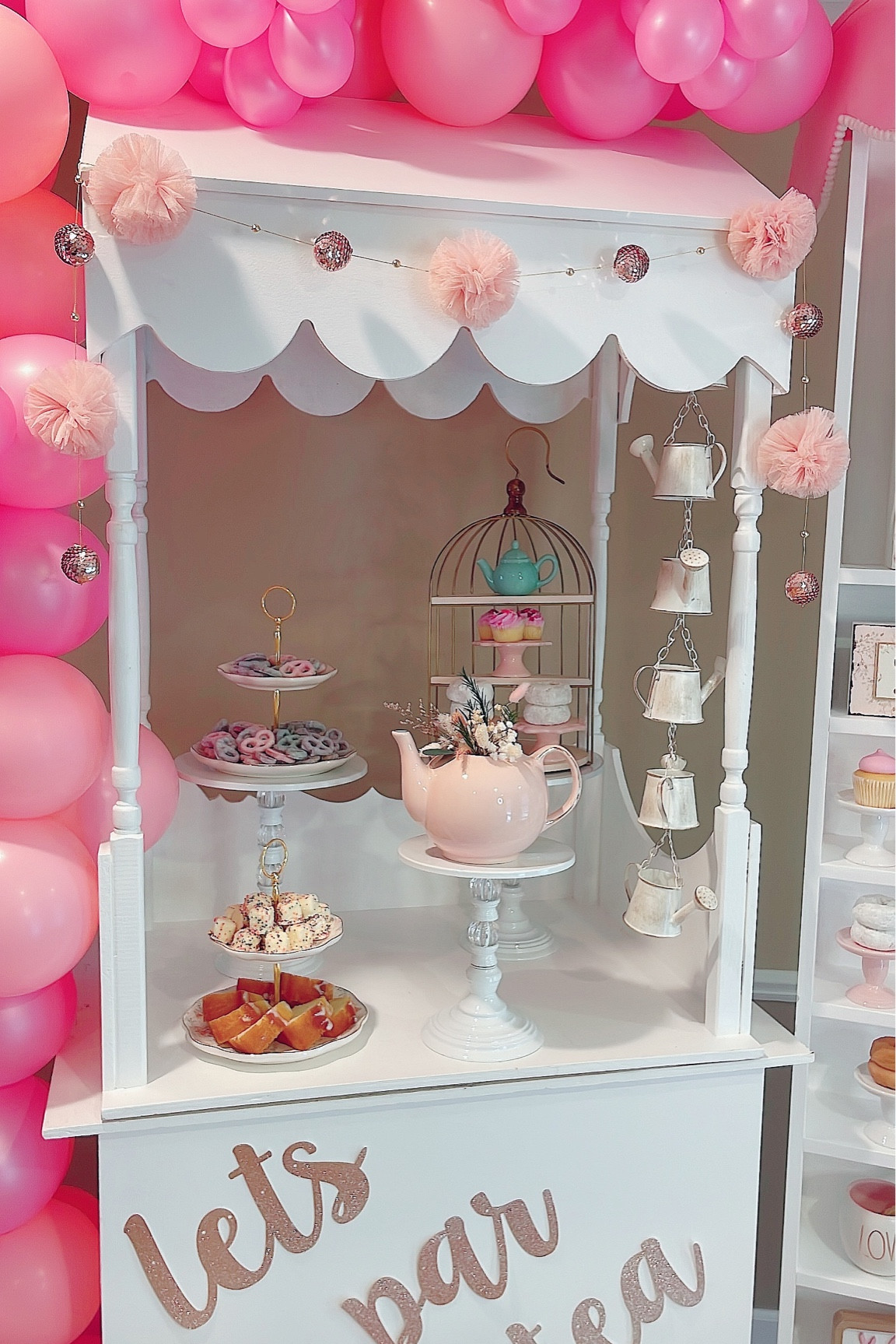 Let’s ParTEA! 🫖

Vintage florals and the prettiest tiered trays, mini mint teal teapots (used as cupcake holders!) and a rustic watering can garland, the most whimsical vintage pink bike, a hand sewn pink canopy complete with pom pom trim, the cutest vintage floral mailbox and plenty of perfectly pastel sweet treats created the most enchanting English tea party set-up!

#LTKSeasonal #LTKhome #LTKwedding