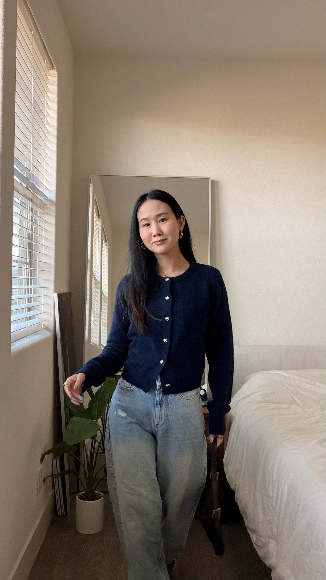 Heart button front knit top + baggy jeans = casual weekend mom look  

#LTKPetite #LTKootd #LTKgrwm