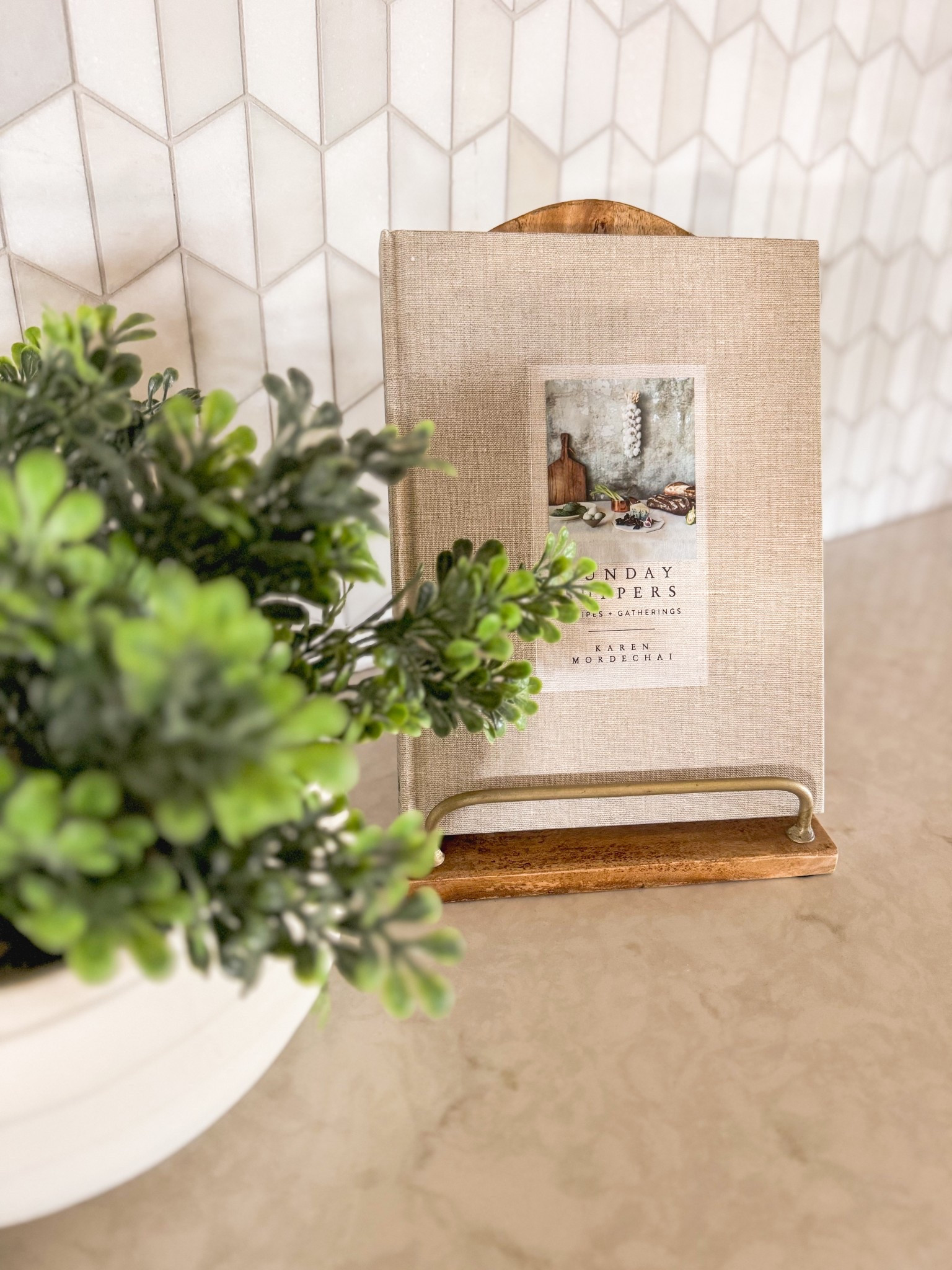 Neutral textures + timeless charm = countertop goals
⠀⠀⠀⠀⠀⠀⠀⠀⠀
A linen-covered cookbook on a wood + brass stand instantly elevates your kitchen styling—perfect for that warm, organic feel we’re all craving.
⠀⠀⠀⠀⠀⠀⠀⠀⠀
Pro tip: Displaying cookbooks vertically adds visual interest and keeps your counters functional.
⠀⠀⠀⠀⠀⠀⠀⠀⠀
#kitchenstyling #neutralhome #organicmodern #cookbookstand #kitchendecor #warmneutrals #countertopstyling #kitchenvignettes #kitcheninspo #modernorganicstyle #interiorstylingideas #neutraldecor #ltkhome #decorfinds #housemademoore

#LTKHome #LTKFindsUnder50 #LTKWatchNow