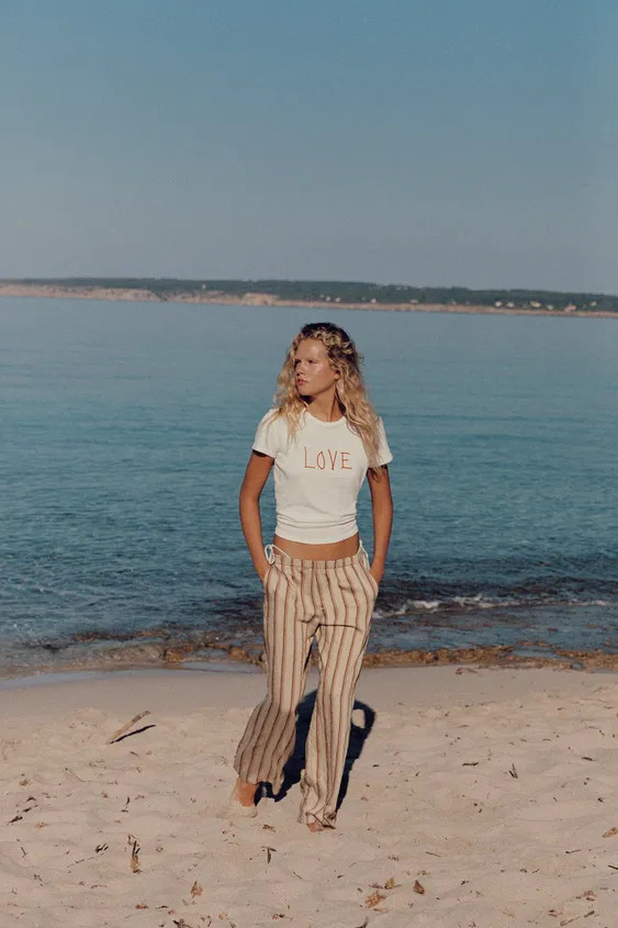 Mid-rise pants with an elastic waistband. Side pockets. | Zara US