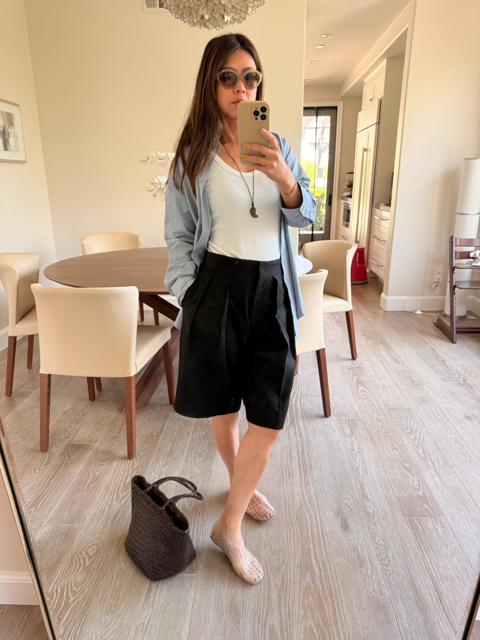 Linen pleated Bermuda shorts with a simple tank top and oversized shirt
The Row dupe Jelly shoes US 7

#LTKSeasonal #LTKStyleTip