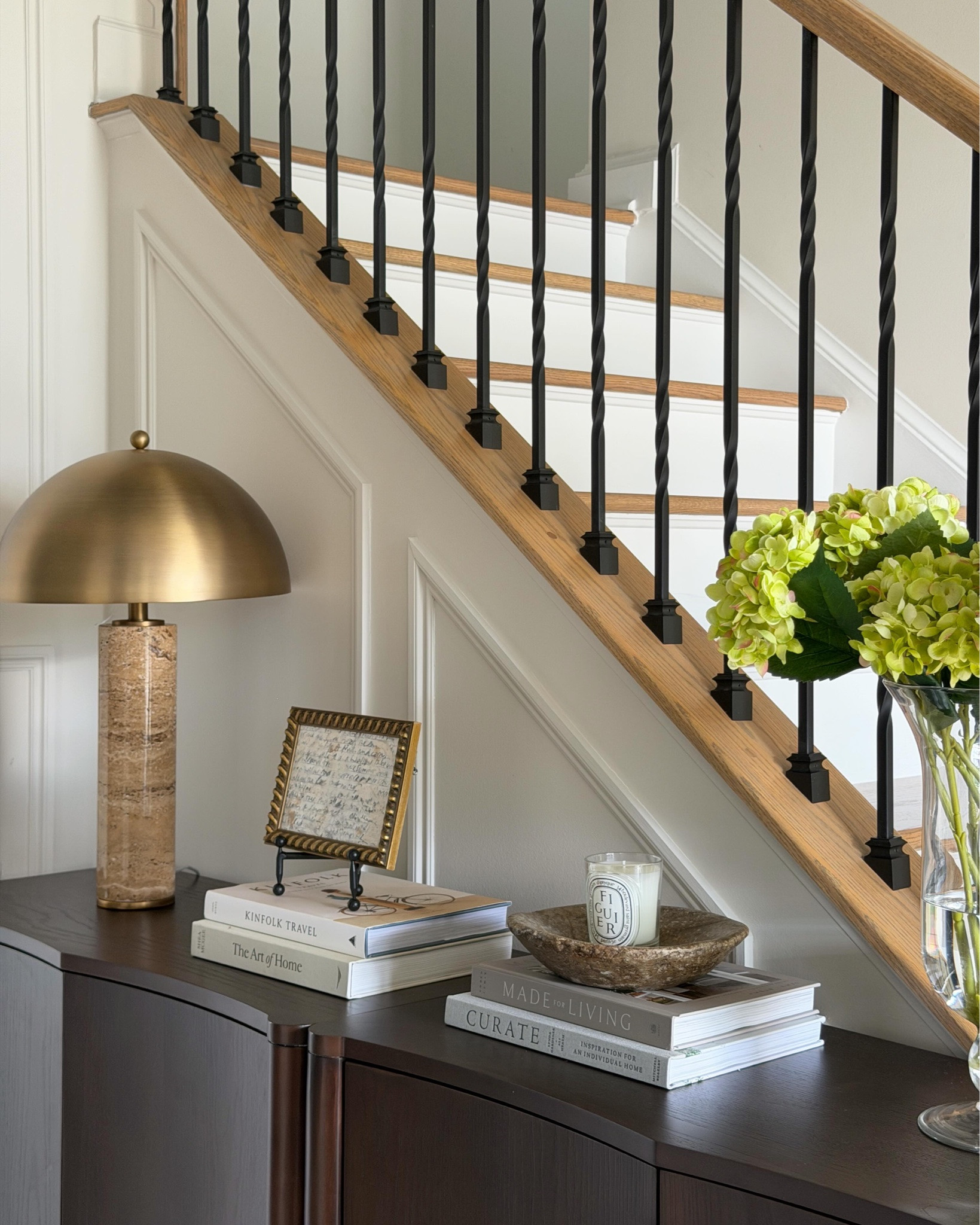 Entryway Styling 101 📝 SAVE THIS! 

• A soft layer → a rug
• A warm glow → a lamp
• A functional touch → a bowl, tray, or hooks
• A reflective element → a mirror
• A natural accent → greenery or fresh flowers
• A vintage touch → something old to bring in character 

When these six elements come together, your entryway instantly feels warm, welcoming + thoughtfully designed.

If you’re stuck on a room or find yourself asking, “What would you do here?” fill out the form in my bio and let’s create a home you love 🫶🏼

#entryway  #entrywaydecor #sideboardstyling #intentionalspaces #timelessdesign