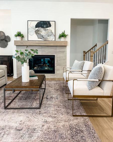 A complementary family room with creams, grays, blacks, wood tones, and a pop of gold. We love how it all came together!

#LTKhome #LTKstyletip #LTKfamily