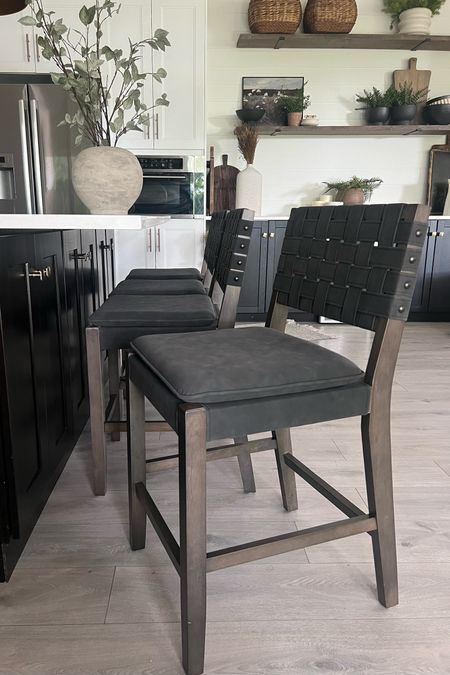 Counter stools: I’m so happy with these. Solid wood.. quality and sturdy! I love the woven leather (faux) strap back, comfy padded seat. Luxe detail like studs on the sides.
On sale right now at Nathan James! 
Sale alert, modern organic kitchen 
. 

#LTKHome #LTKSaleAlert