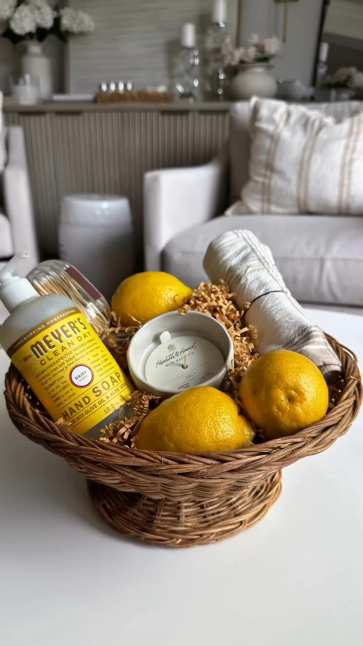 The easiest last-minute hostess gift recipe for summer ☀️🍋👇

Stop bringing a random bottle of wine and bring literal sunshine in a basket instead. It looks incredibly curated, but you can throw it together in 5 minutes flat.
The Recipe:
🧺 A simple basket
🧼 A premium hand soap & matching candle
🌾 A crisp white flour sack towel for texture
🍋 Fresh lemons for a bright pop of color
🪵 Fancy matches in a glass vessel
🌼A kitchen towel

It’s classic, entirely functional (no wasted clutter), and looks like a boutique hotel stay.
Save this post for the next time you need a quick, chic gift!
🌼

hostess gift. gift basket. summer hosting. gift ideas. tablescape. home decor. hosting tips. last minute gift.
Gift basket ideas. Summer party ideas.

#LTKSeasonal #LTKHome #LTKmomlife