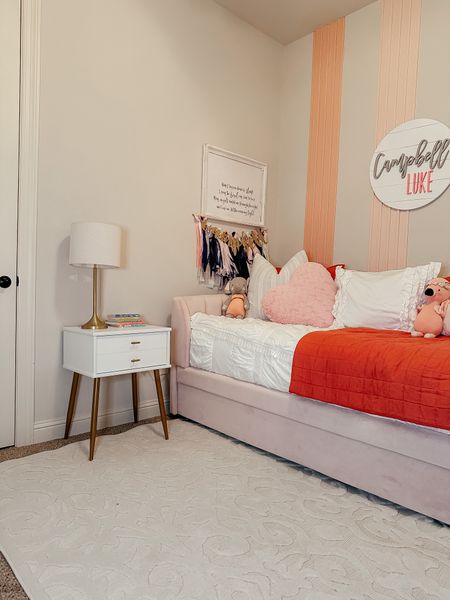 Daughters bedroom. Girls room. Pink bed. Daybed. Beddys bedding. Nightstand. Accent wall. Pink room. Cuddle and kind dolls 

#LTKfamily #LTKkids #LTKhome