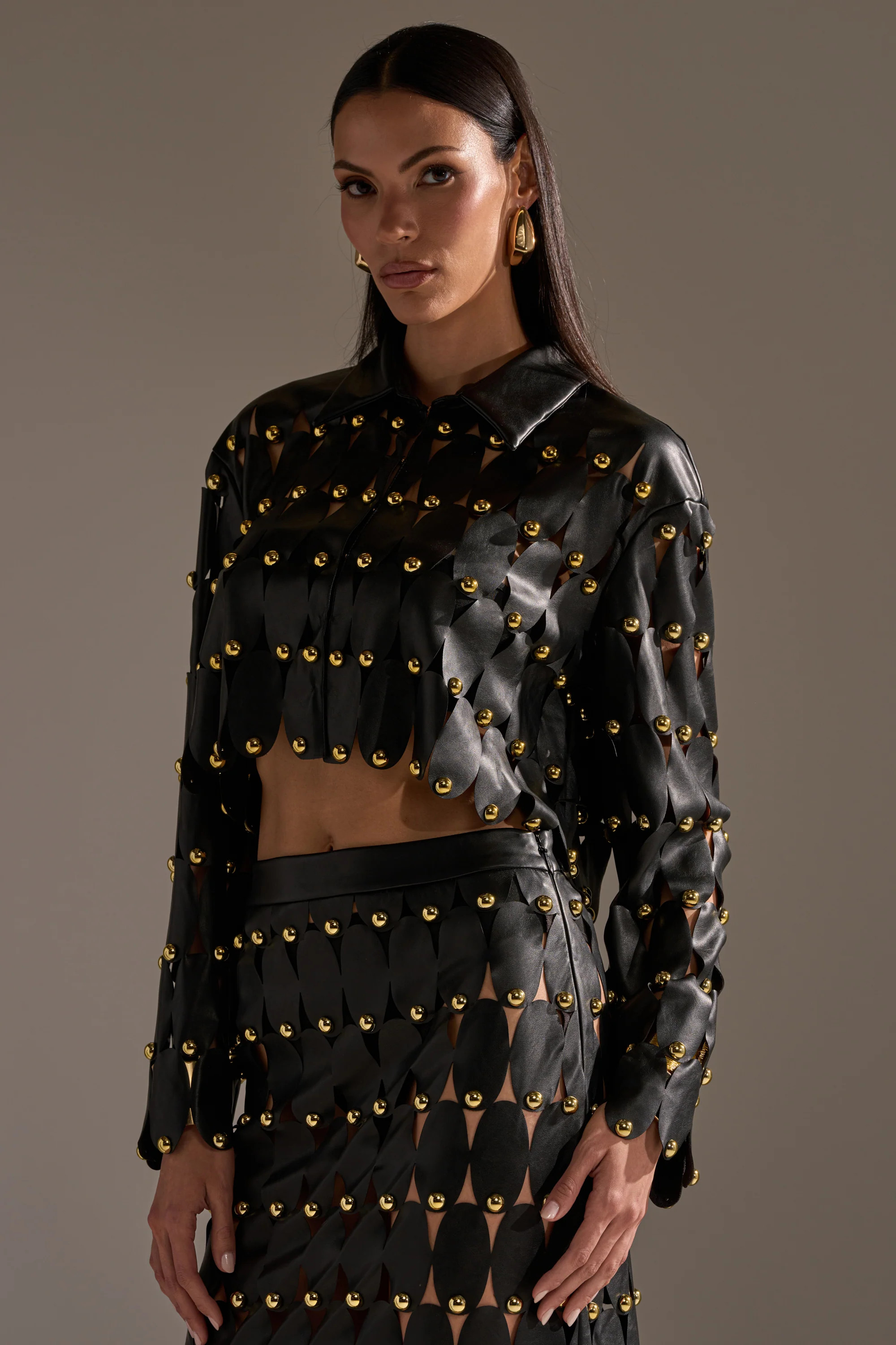 THE SNEAK PEEK STUDDED PU BLOUSE IN BLACK | AKIRA