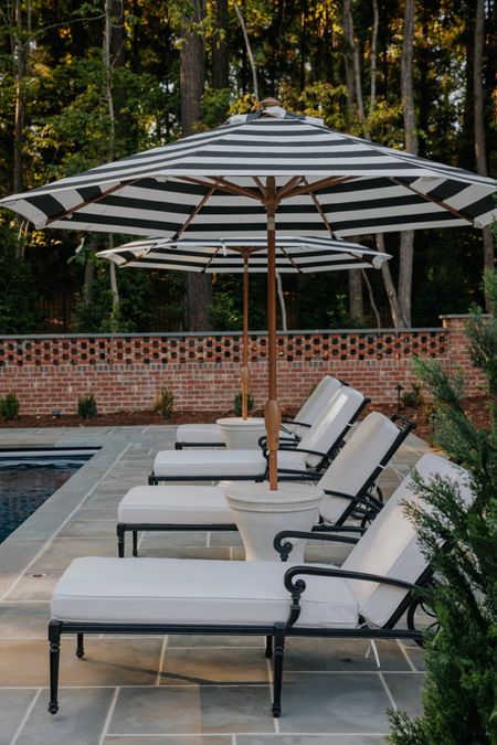 It’s been one year since we transformed our backyard and we’re giving an update on our outdoor furniture plus all of our tips and tricks for caring for outdoor furniture at ChrisLovesJulia.com today 🖤

Pool chaise lounge, striped umbrella, umbrella stand table

#LTKSeasonal #LTKhome