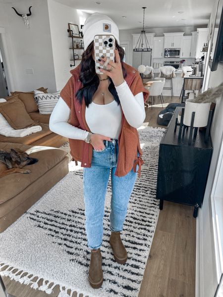 Bodysuit — small
Vest — small
Jeans — 2

comfy outfit | fall outfits | cozy outfit | errands outfit fall | platform Chelsea boots | Ugg inspired boots | free people inspired vest | Sherpa vest | fleece vest | carharttt beanie | mom jeans | casual outfits | Amazon outfit 



#LTKshoecrush #LTKfindsunder50 #LTKstyletip