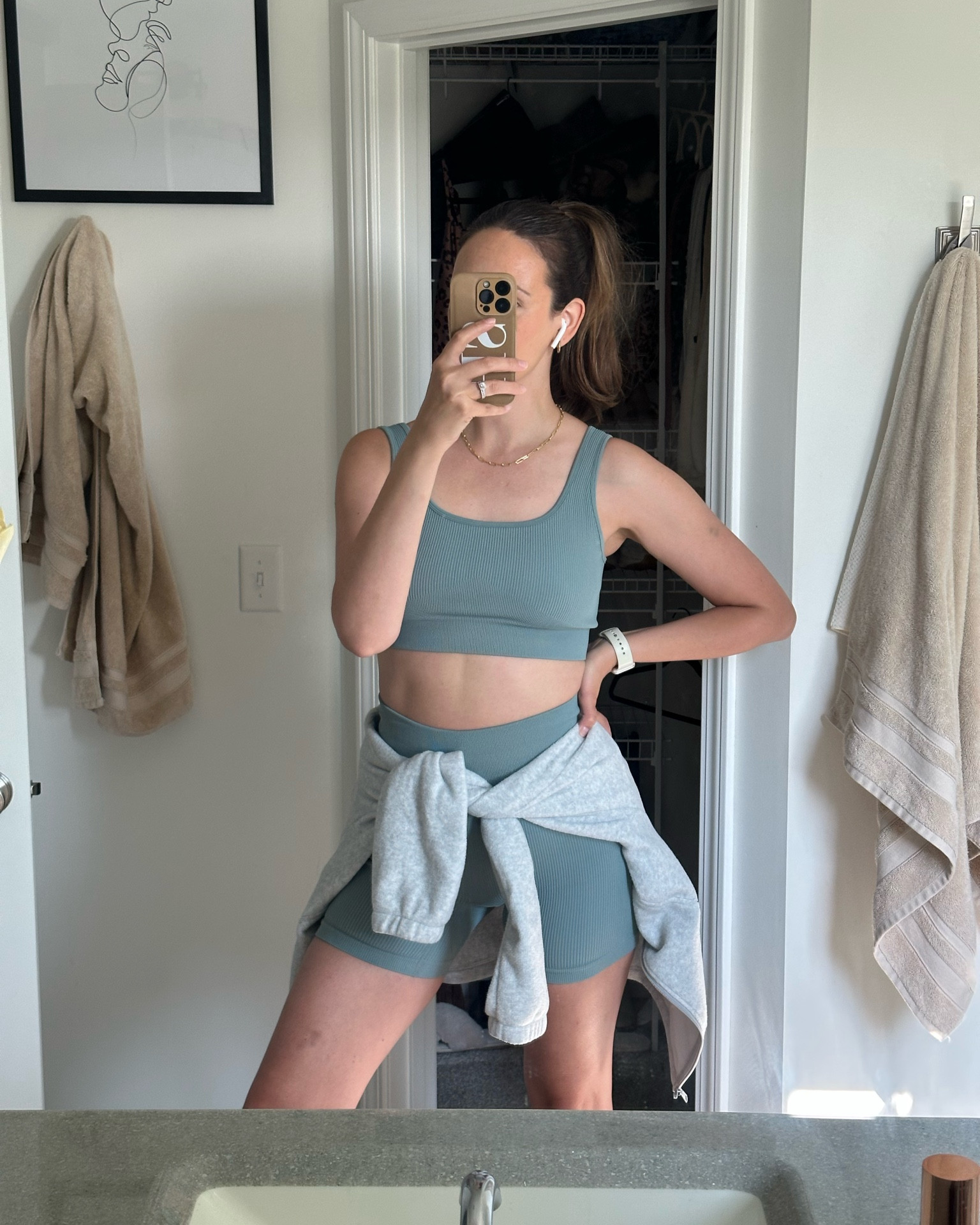 Womens workout set. Blue activewear. Blue biker shorts. Blue sports bra. Workout outfit. Workout fit. Grocery shopping outfit. Running errands outfit. Grey zip up. Grey sweatshirt. 

#LTKstyletip #LTKunder50 #LTKFind