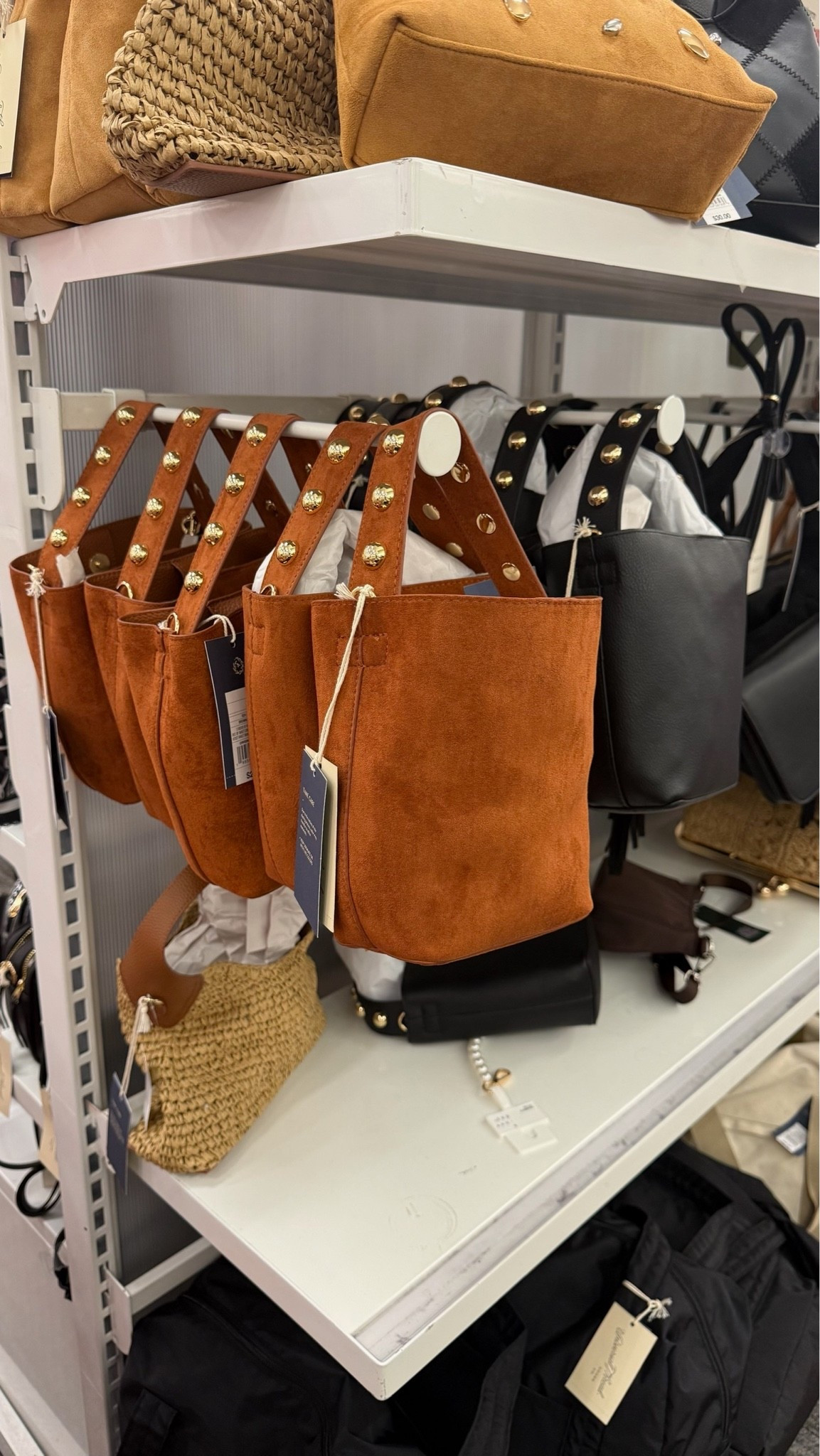 Studded suede-like bucket handbag find!

#LTKootd #LTKgrwm