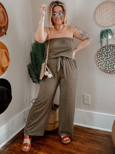 Green strapless amazon jumpsuit! Super stretchy + soft with pockets. 5’1 wearing a small! Paired with colorful tassel earrings and beachy clutch shoulder purse. Vacation outfit idea. Summer outfit idea. 

#LTKstyletip #LTKSeasonal #LTKFind