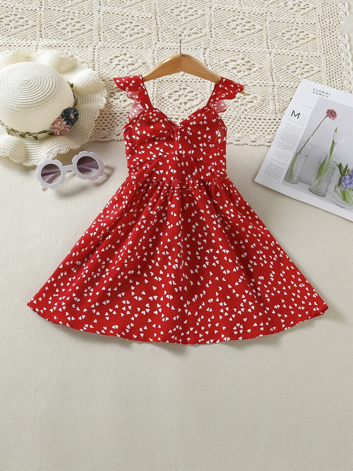 SHEIN Kids EVRYDAY Young Girl Confetti Heart Print Twist Shirred Dress | SHEIN