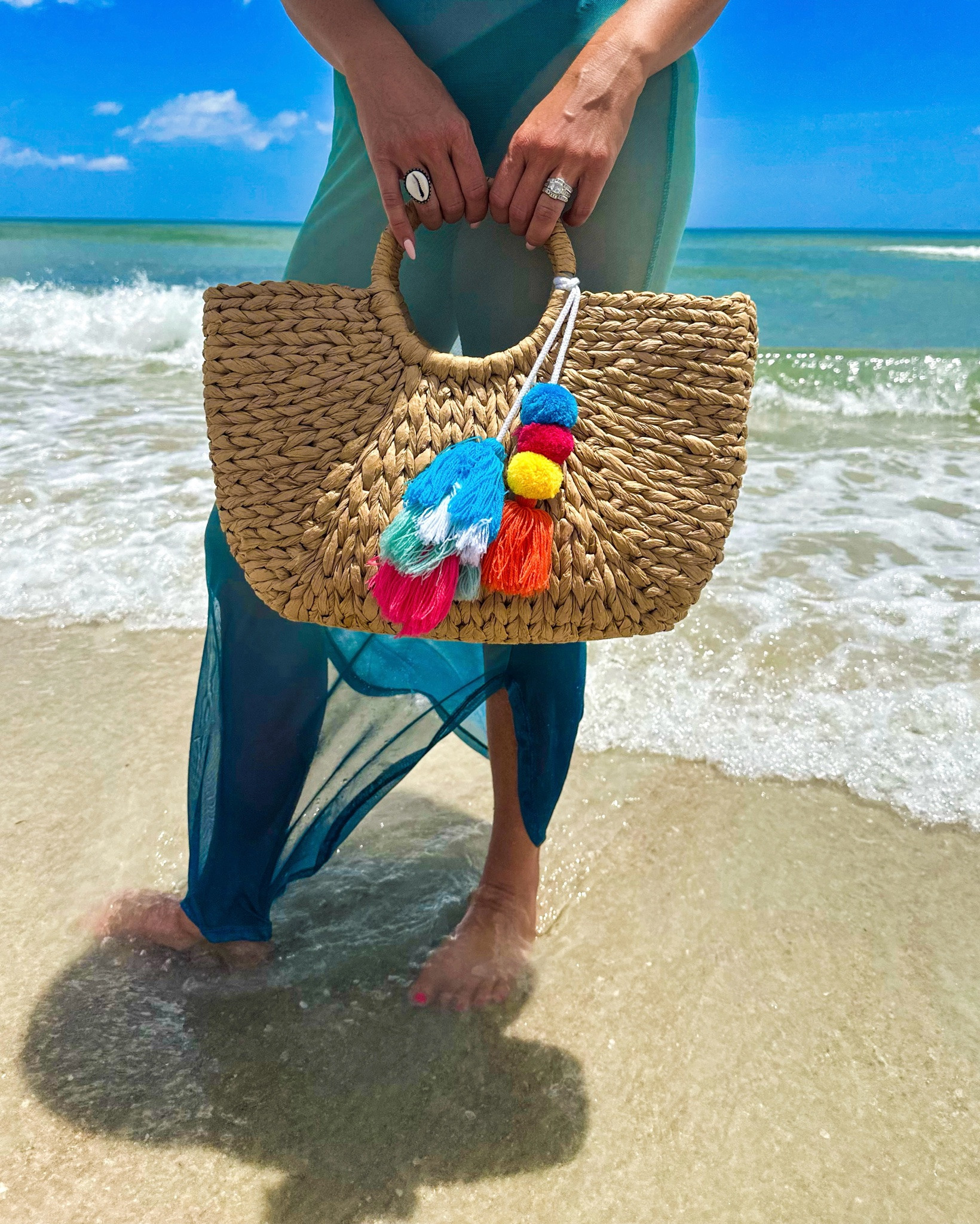 I’m a sucker for a good beach tote and this is one of my favorites! It holds everything I need for the perfect beach day. Toss in the sunscreen, snacks, sunglasses and towel - it can handle it all. And the colorful pom details add the perfect pop of color to every beach look! Grab it before it’s gone 🩵

#LTKSwim #LTKTravel