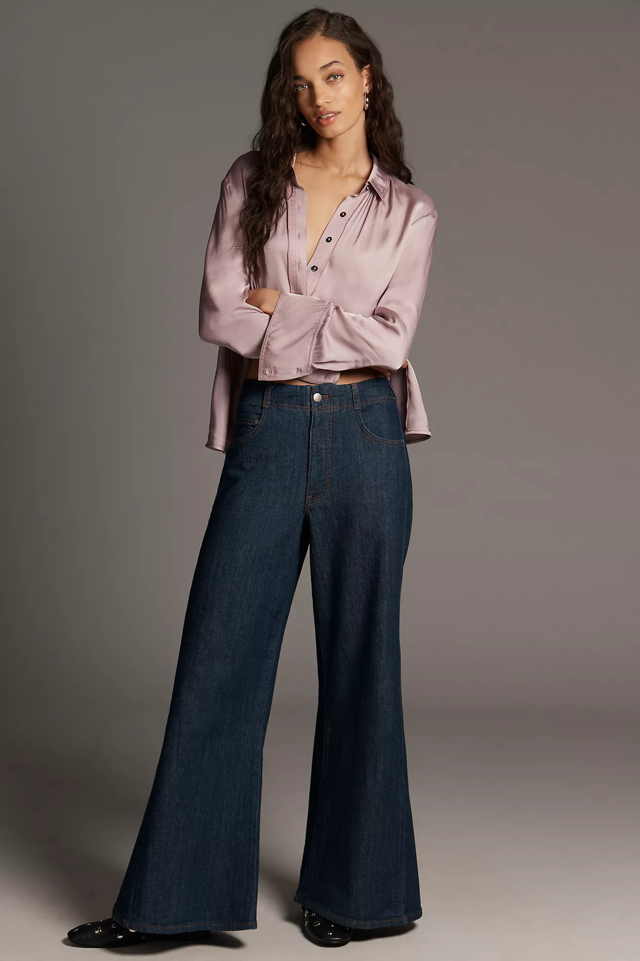 The Adi Regenerative Cotton Mid-Rise Flare Jeans by Pilcro | Anthropologie (US)
