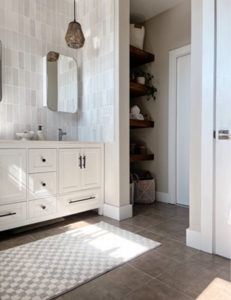 This checkered rug is washable! It fits perfectly in our bathroom as a bath mat but could also be a great size for an entry way, hall, or kitchen! 

#LTKFind #LTKunder50 #LTKhome