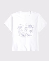 Women's Short-Sleeve The White Lotus Graphic Skimming Tee | Women's Tops | Abercrombie.com | Abercrombie & Fitch (US)