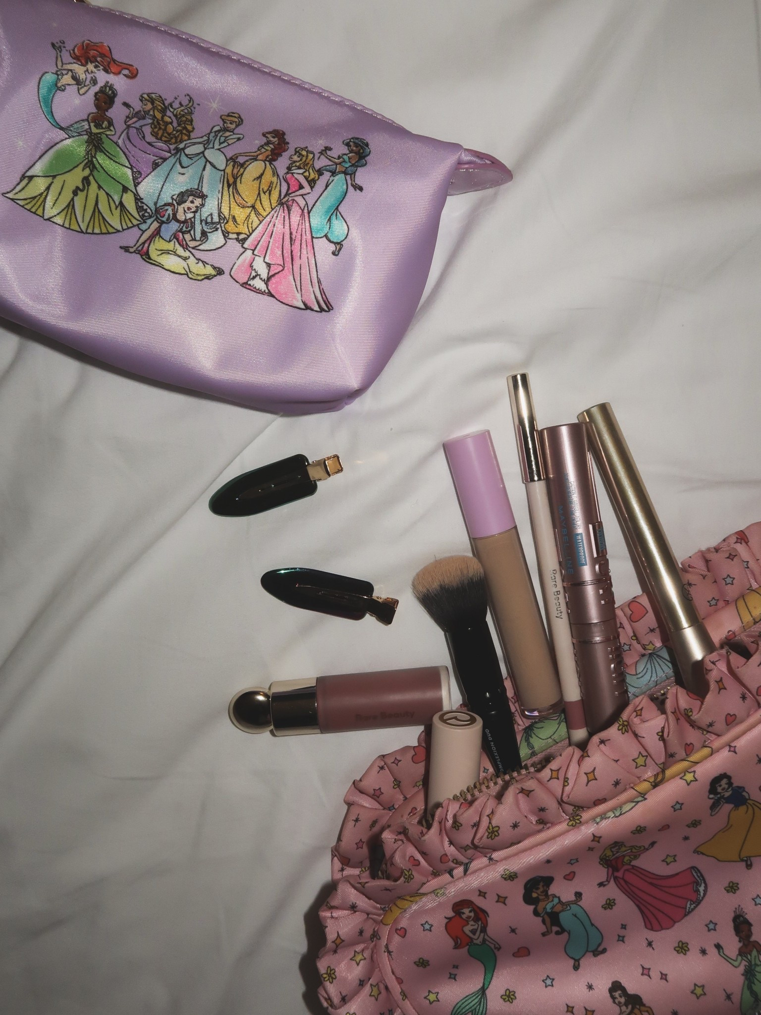 Beauty necessities 💗✨

Makeup pouches from Stoney Clover Lane
Hair clips from the Wicked collection at Ulta
Makeup from Rare Beauty, Tower28, and Maybelline 
Makeup brushes from Sonia Kashuk and Elf at Target 

Ig: @jkyinthesky 

#travel #travelessentials #makeup #makeupessentials #makeuproutine #aestheticstyle #disneystyle #sephora #everydaymakeup #disneyprincesses 

#LTKBeauty #LTKFindsUnder100 #LTKTravel