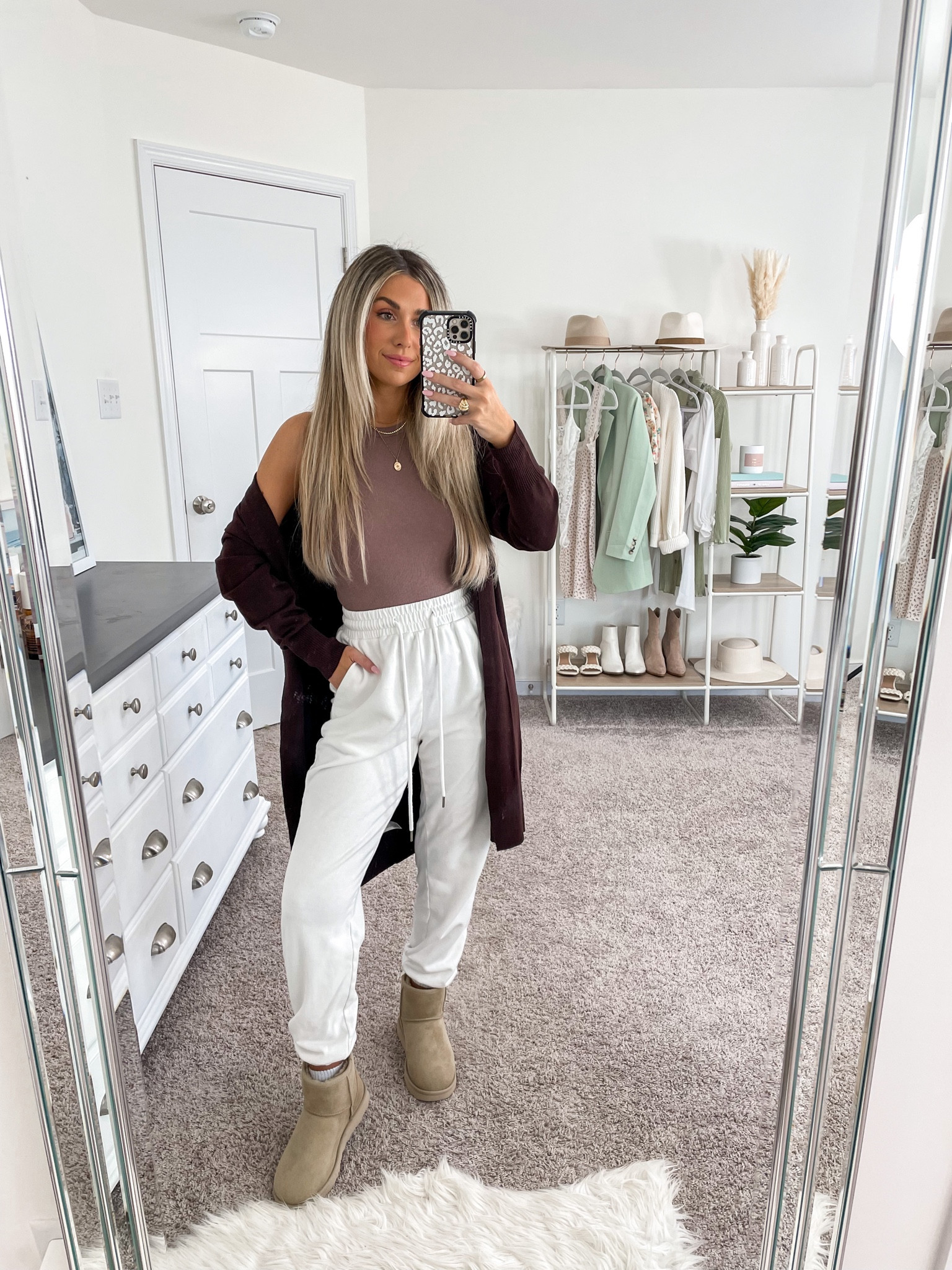 Comfy and casual fall outfit 🫶🏼
+ target cardigan: xs
+ target tank top: xs 
+ Amazon sweatpants: small 
+ Ugg minis in mustard seed: size 6

#LTKstyletip #LTKfindsunder100 #LTKSeasonal