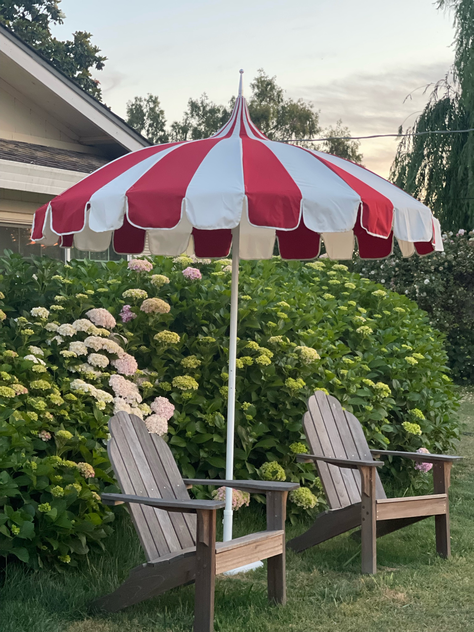 Pagoda umbrella. Pagoda. Red and white stripe patio umbrella. Patio furniture in garden. Amazon home. Amazon finds. Walmart home. Walmart finds. ❤️

#LTKhome #LTKSeasonal #LTKFind