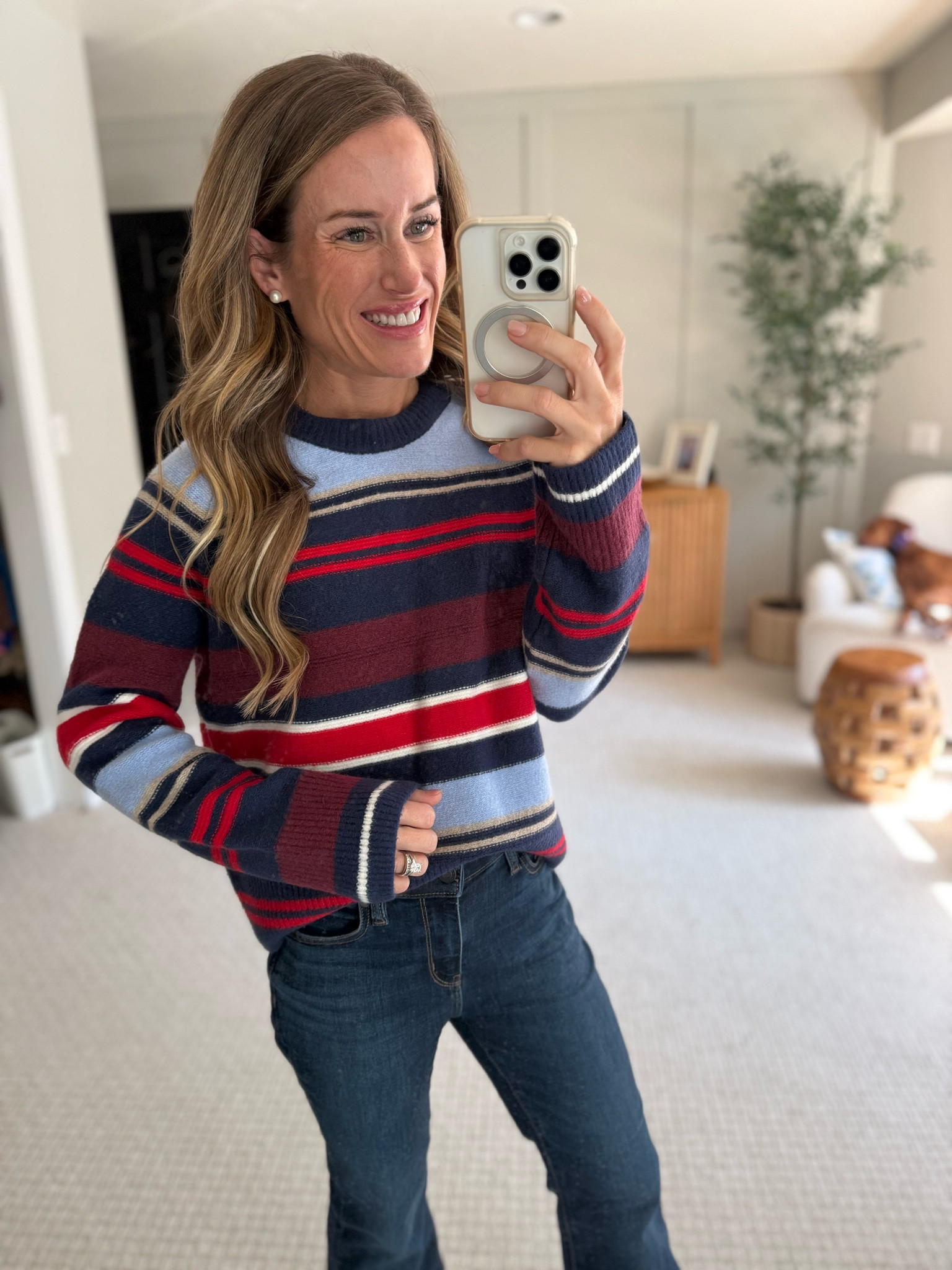 A striped top and jeans bring easy style to the day. Try layering a classic knit for breezy mornings.