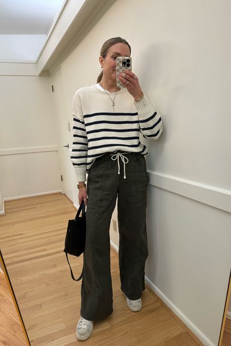 Spring outfit: striped sweater, splendid wide leg olive pants, sneakers, Portland leather crossbody tote in black. Code JK20 for pants. Travel outfit, work outfit, weekend outfit 

#LTKover40 #LTKstyletip #LTKfindsunder100