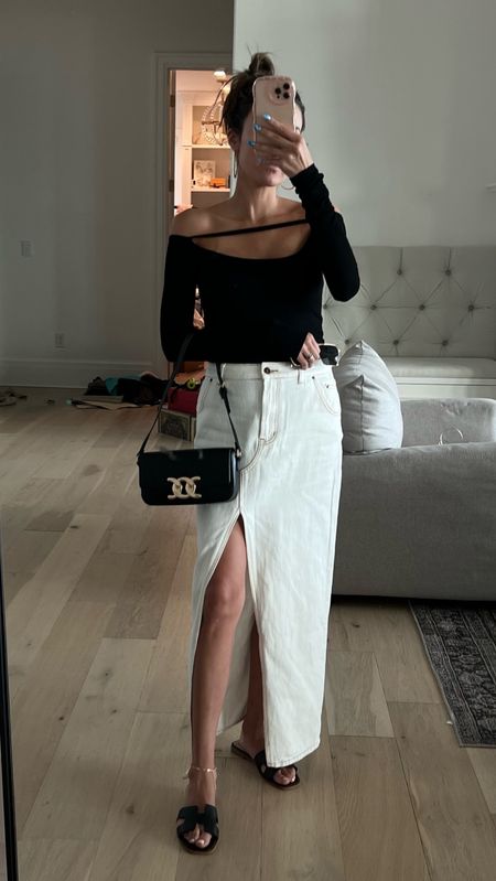 Black & white date night outfit 🖤🤍 I love how this long white skirt can be dressed up or down for the summer! 
Sizing:
Top- small
Skirt - small

Summer outfit; date night outfit; white slit skirt; revolve; H&M; Christine Andrew 

#LTKshoecrush #LTKunder100 #LTKstyletip