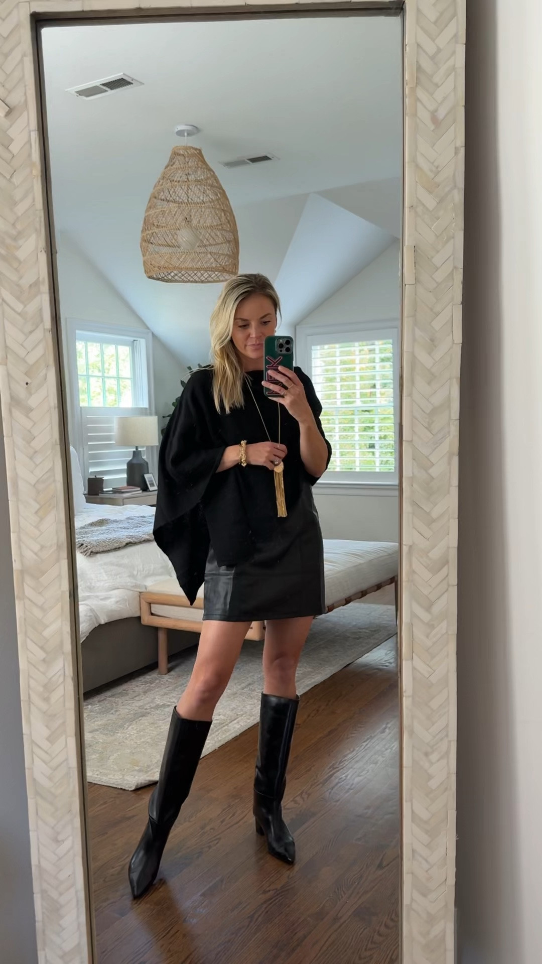 if you need a layer over your dress but don’t want to wear a jacket, try a poncho!  Love this all black look for a fall date night or girls night out 
•poncho, one size 
•small faux leather dress, tts, I’m 5’5 and it has adjustable straps 
•black knee high boots tts