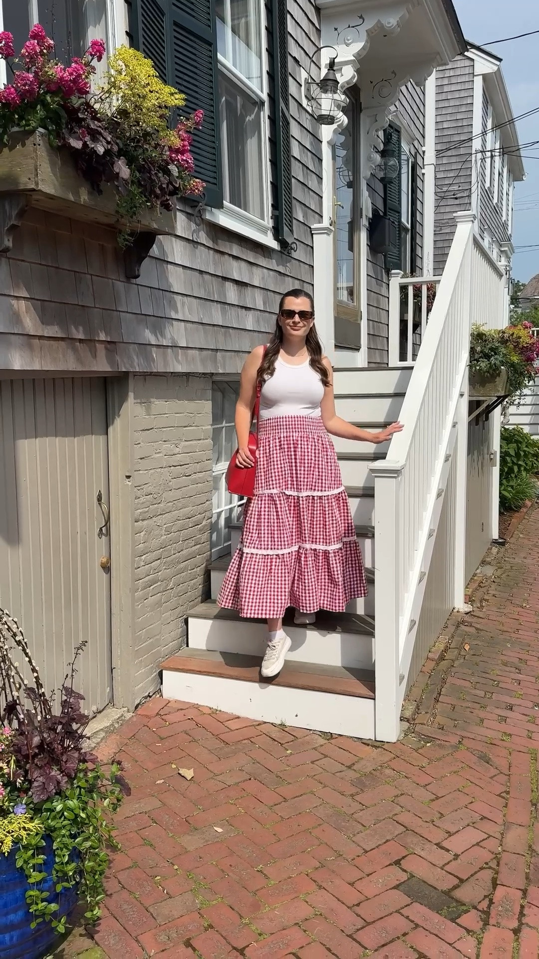 This red gingham skirt is perfect for a coastal trip! I wore this in Nantucket for a day of exploring and it was perfect. I paired it with a plain white tank and white low top canvas sneakers.

#LTKootd