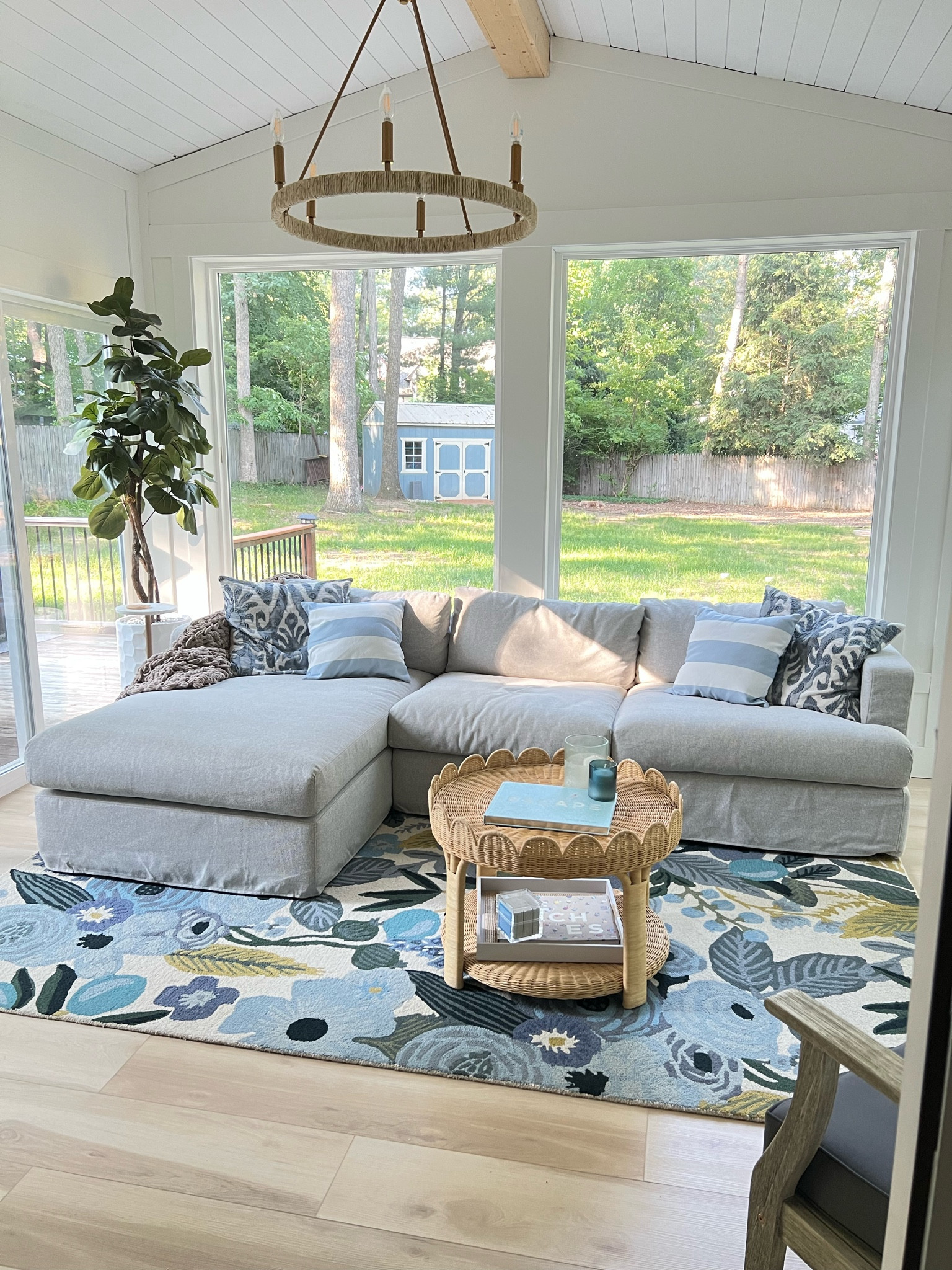 Coastal modern four season porch room inspiration. Navy and white home decor with preppy touches and rattan accents. #rattan #amazonhome #coastalmodern #potterybarn #navyandwhite #preppyhome 

#LTKhome #LTKSeasonal #LTKstyletip