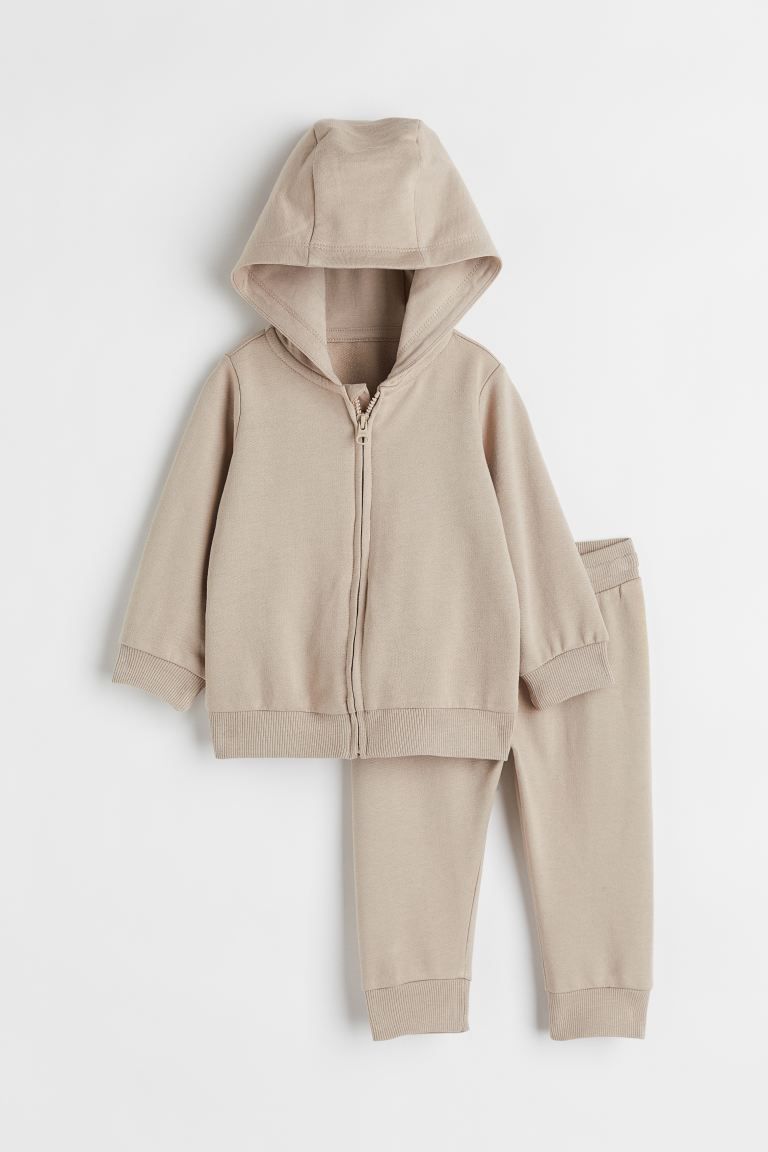 Conscious choice  Set with a hooded sweatshirt jacket and sweatpants in soft, organic cotton fabr... | H&M (US + CA)