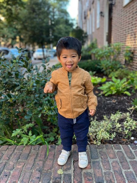 Theo is wearing a 2T

Toddler boy outfit
Fall outfit for toddler boy 
Toddler boy clothes
Brown bomber jacket
Green t-shirt
Navy pants 
White Velcro sneakers 

#LTKfamily #LTKSeasonal #LTKkids
