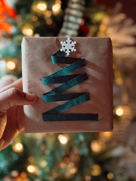 Festive and fun gift wrap idea using craft paper and a green ribbon to make a tree
Gift Wrapping Christmas Gifts 

#LTKHoliday #LTKSeasonal #LTKhome