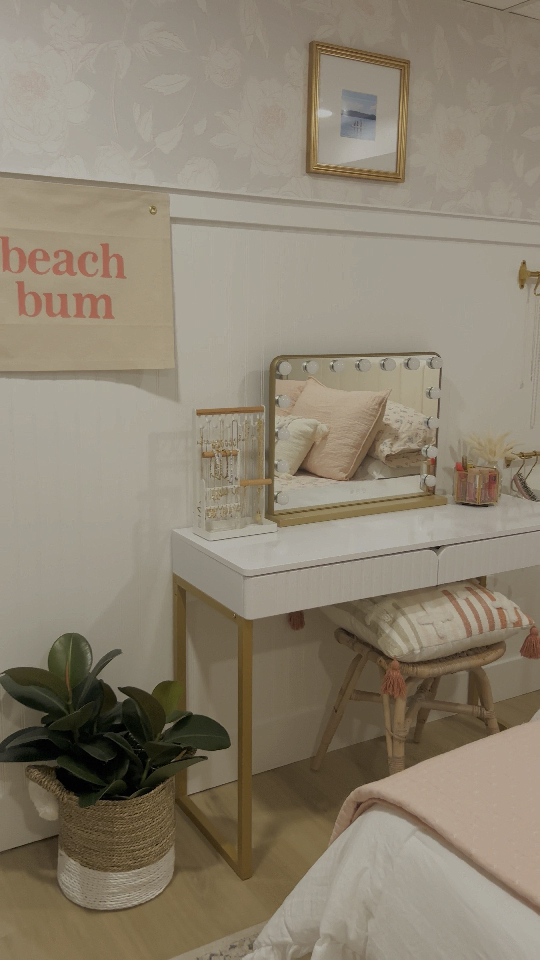 Teen girl bedroom decor!
Jewelry organizer
Makeup organizer
Wall hook
Lindsay letters art print 
Glass door knob
Beach bum canvas flag
Wall art
Wall decor
Beach bedroom
White vanity desk
Vanity mirror
Bedding
White comforter
Blush quilt
Picture frame
Pin board
Gold picture frame
Tall white dresser
Fluted dresser
Macrame plant hanger
Lumbar Throw pillow 
Amazon 
Target
