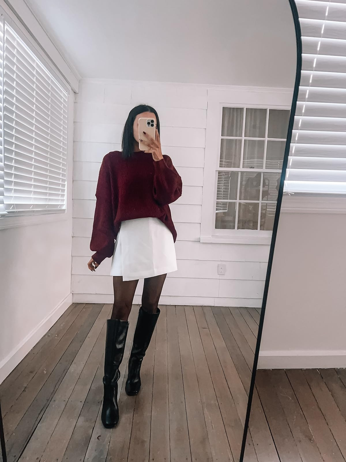 Christmas party outfit- sweater in S, skirt in XXS (size down runs big), boots true to size. Oversized sweater/white mini skort/black knee high boots.
 

 #LTKHoliday #LTKPetite #LTKFindsUnder100