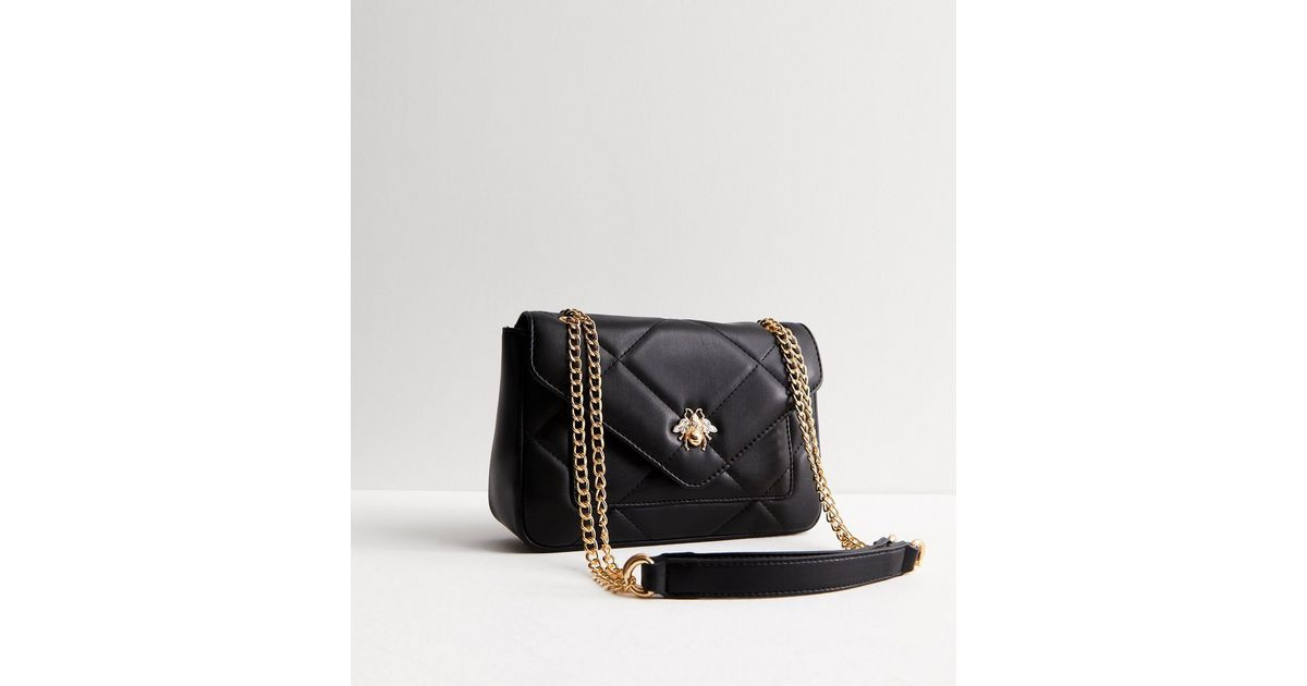 Black Quilted Bee Cross Body Bag
						
						Add to Saved Items
						Remove from Saved Items | New Look (UK)
