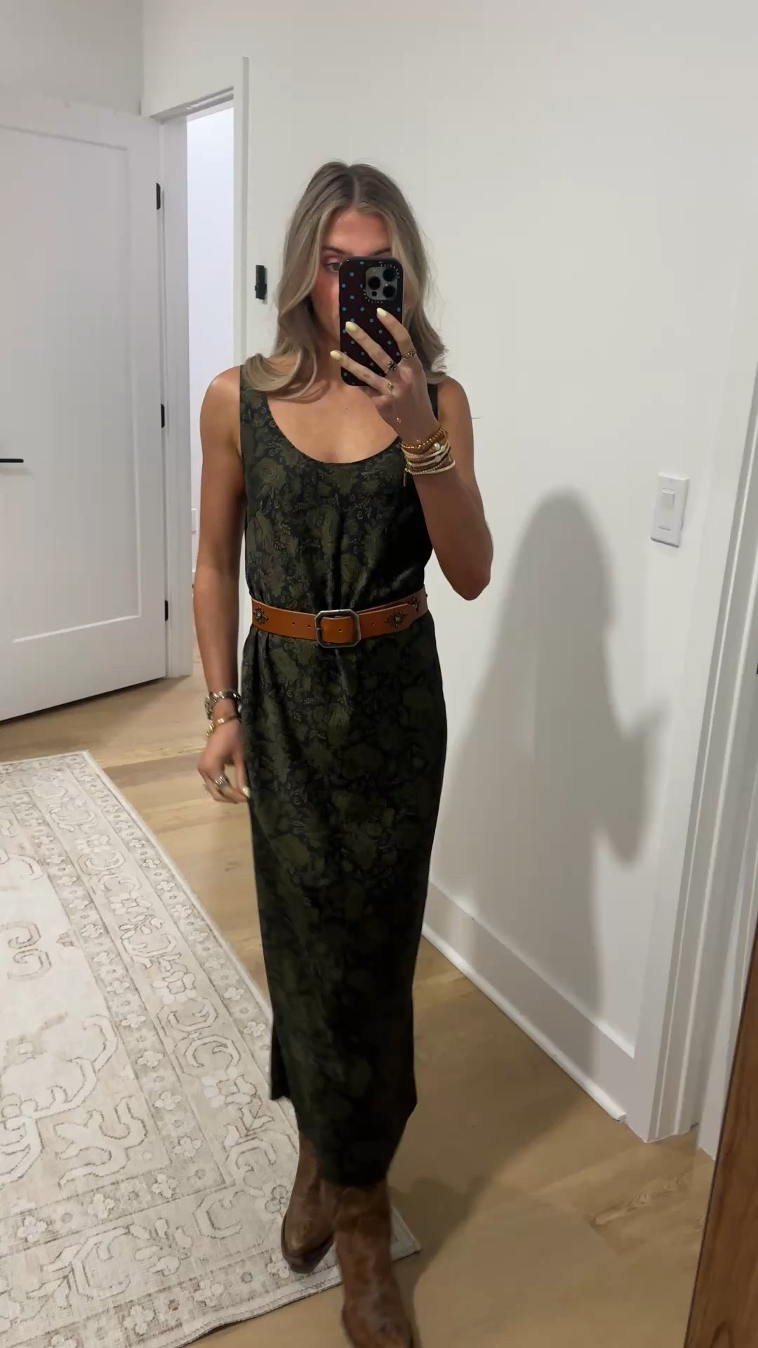 Friday night outfit! I wore a @fashionpass @caminyc satin green midi dress and my belt is from @oldstudhandmade I am obsessed with it. My boots are from boot barn Idyllwind of course and I ended up wearing a faux leather jacket over my shoulders too  

#LTKootd #LTKdayinmylife #LTKgrwm