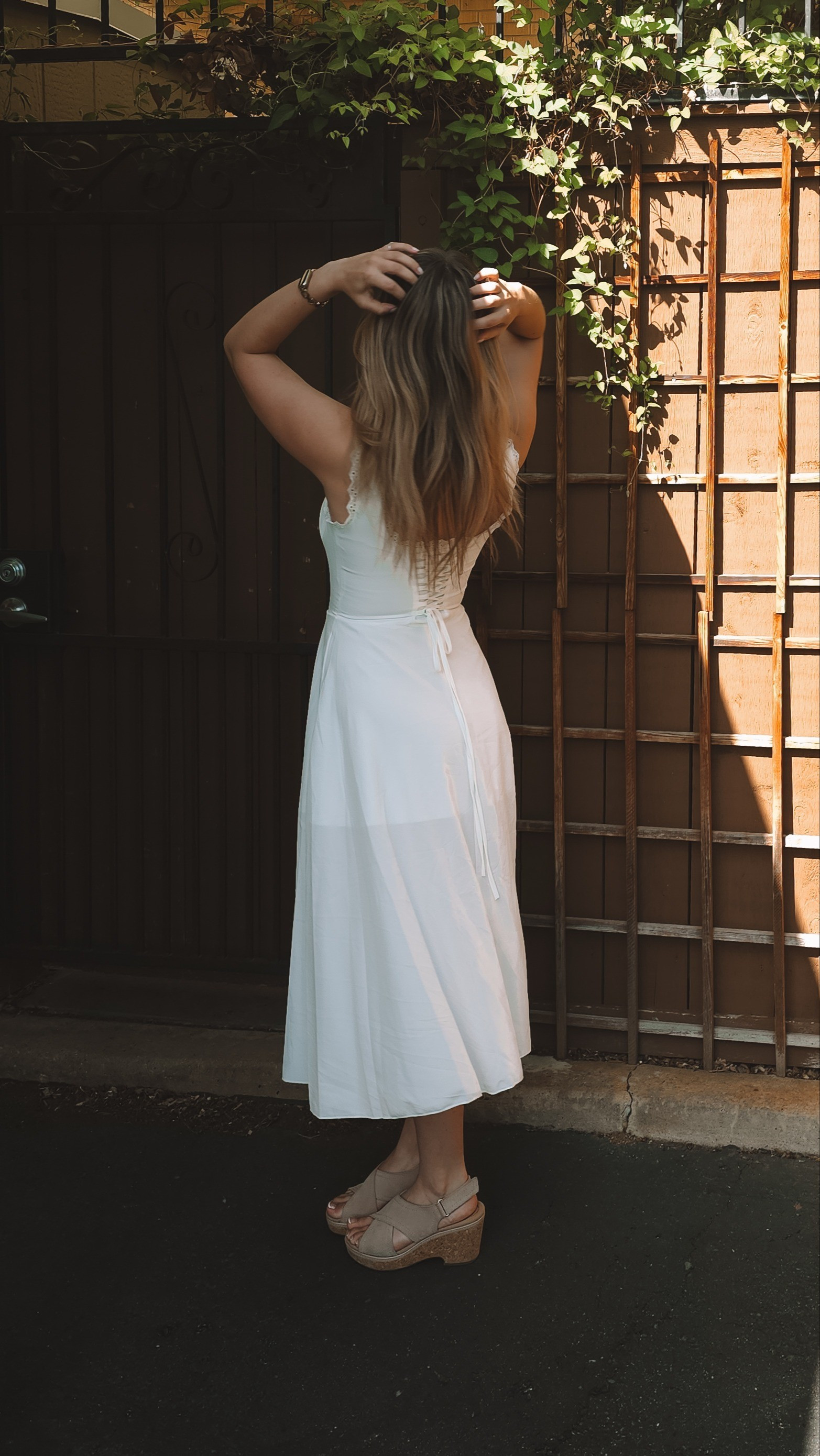 a moment for the back of the corset dress 🫶🏻 this white dress is under $25 on amazon! wearing a small. 

#LTKFindsUnder50 #LTKParties #LTKSeasonal