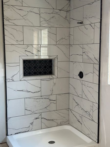 Our bathroom shower tile is in! I love the marble look in a durable porcelain tile  

#LTKhome