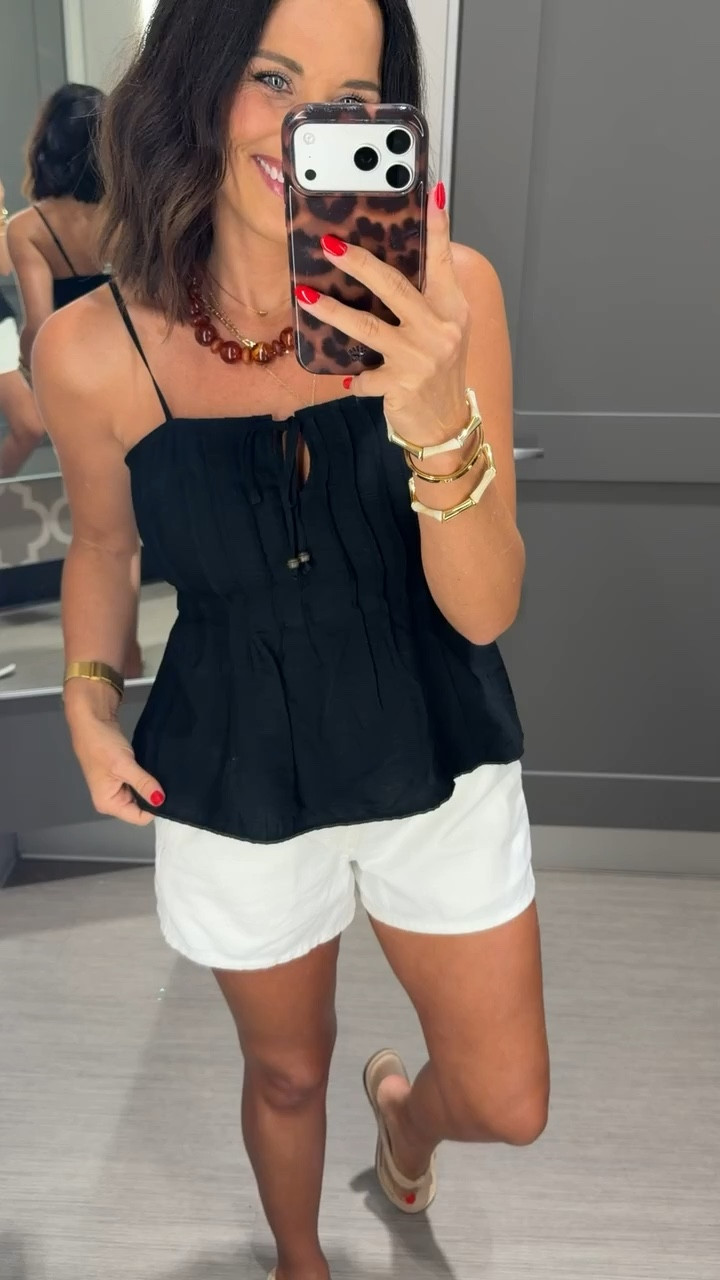 This Target top is one of those pieces you’ll wear on repeat. 🤍 So easy to dress up with linen pants or keep casual with your favorite denim shorts. I had to bring this one home!

Size XS
5’3” for reference

#TargetStyle #TargetFinds #TargetFashion #TargetRun #SummerStyle #EverydayOutfit #AffordableFashion #ClosetStaples #LTKStyle #CasualChic