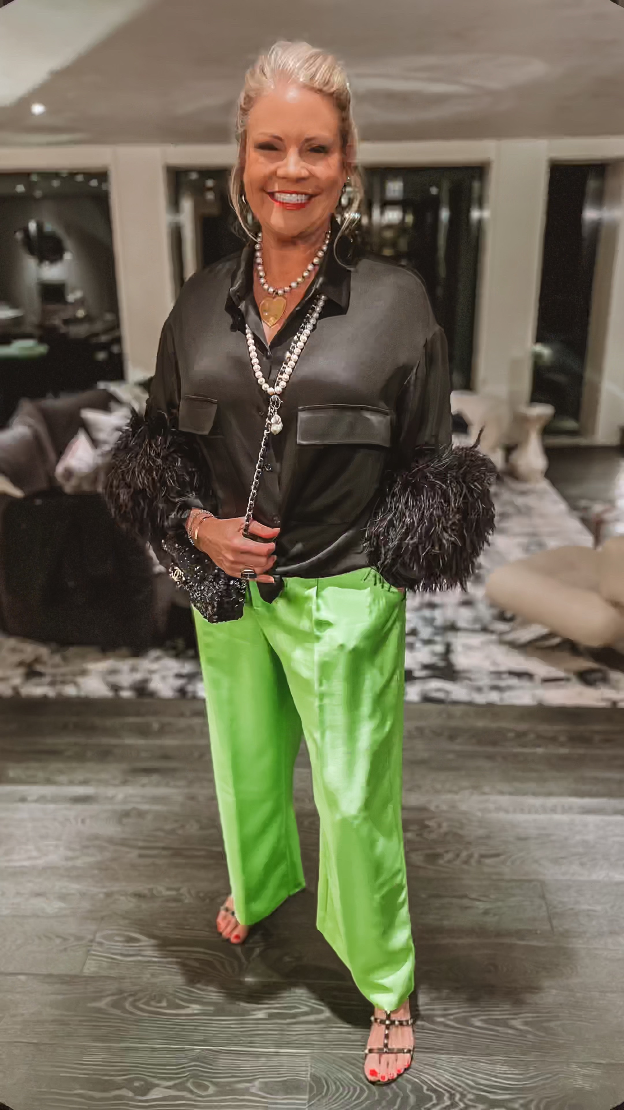LaPointe feathers. Black blouse with satin and silk green pants. Swarovski ring and pearl necklace. Black Valentino shoes and a black, sparkly Chanel purse  

#LTKSeasonal #LTKover40 #LTKMostLoved