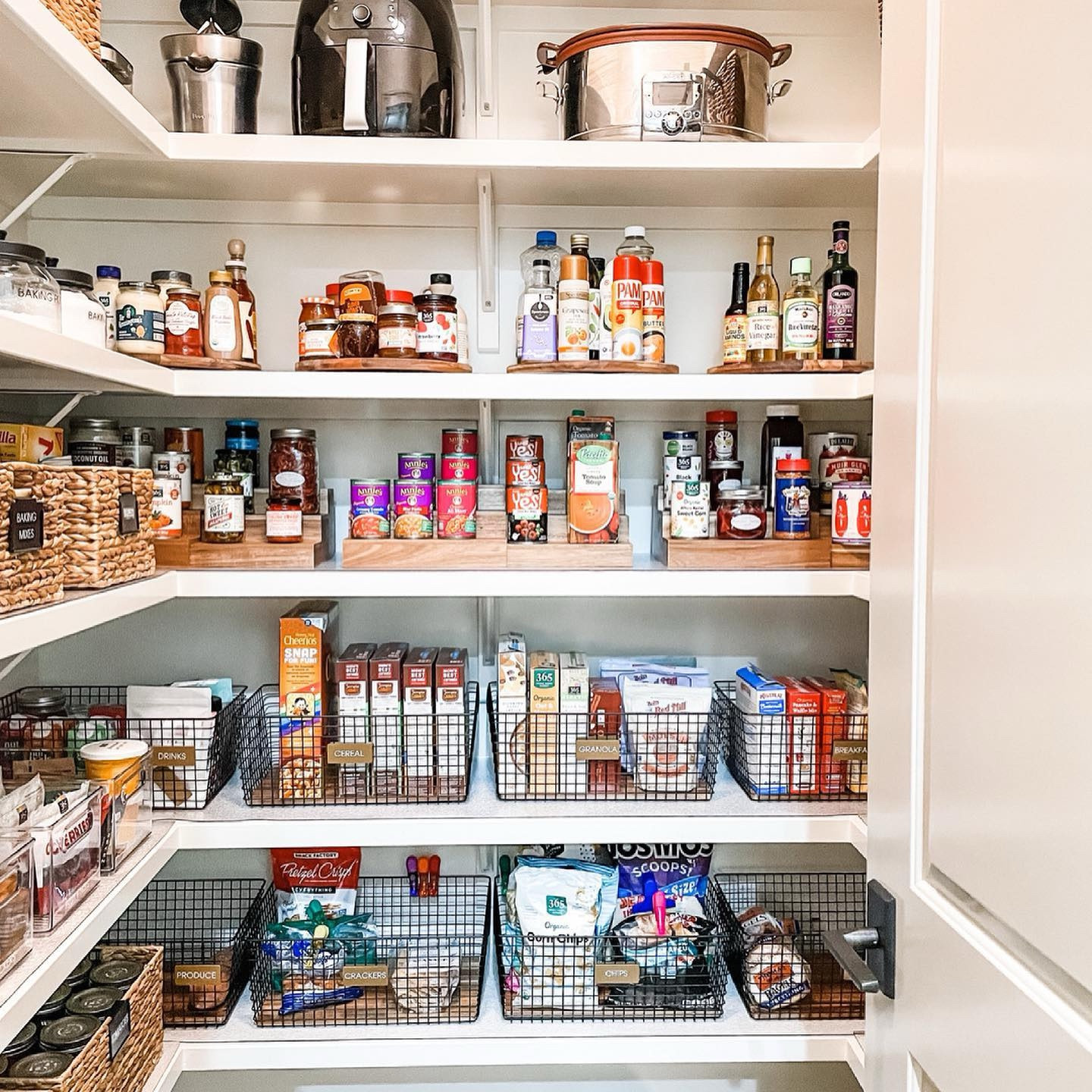 One of the key things when determining what product to use is knowing what is going in a space. I promise you, the best thing you can do is take everything out, check every expiration date, measure your shelves and then, FINALLY decide on what product will best utilize the space. 
⠀⠀⠀⠀⠀⠀⠀⠀⠀
This pantry has it all: turn tables, tiered can risers, baskets and acrylic bins. And each of those products helped make this space function both efficiently, and I might add, beautifully!
⠀⠀⠀⠀⠀⠀⠀⠀⠀