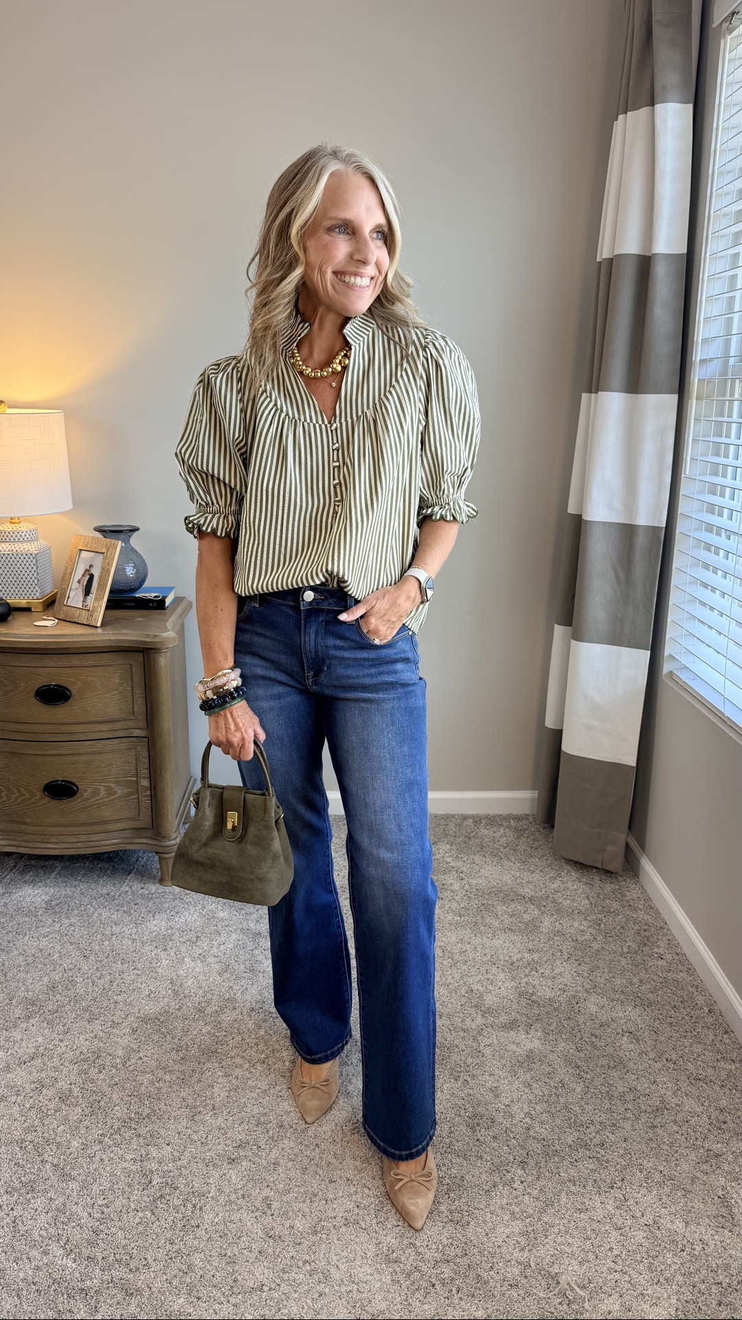 Dressing for early fall has never been easier! I love this cute top. That’s a seersucker fabrication. I’m wearing a small and it also comes in a solid olive green. That is adorable. These jeans are fantastic! Wearing size 27. They’re a longer kick version of one of my favorite pairs from Avara

#LTKgrwm #LTKootd #LTKOver40