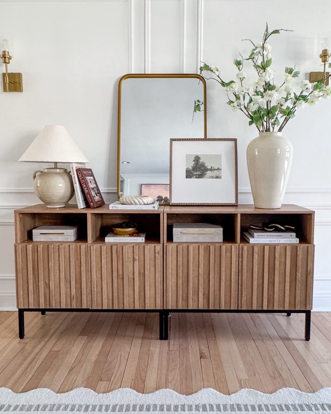 Loving how this wood console turned out! Playing around with books, art, and a mix of neutrals – it’s one of those spots that just makes me smile every time I walk by. The best part? These consoles are under $250 each, and I paired two together to create the perfect entry look! 🤎

#LTKHome #LTKStyleTip #LTKSaleAlert