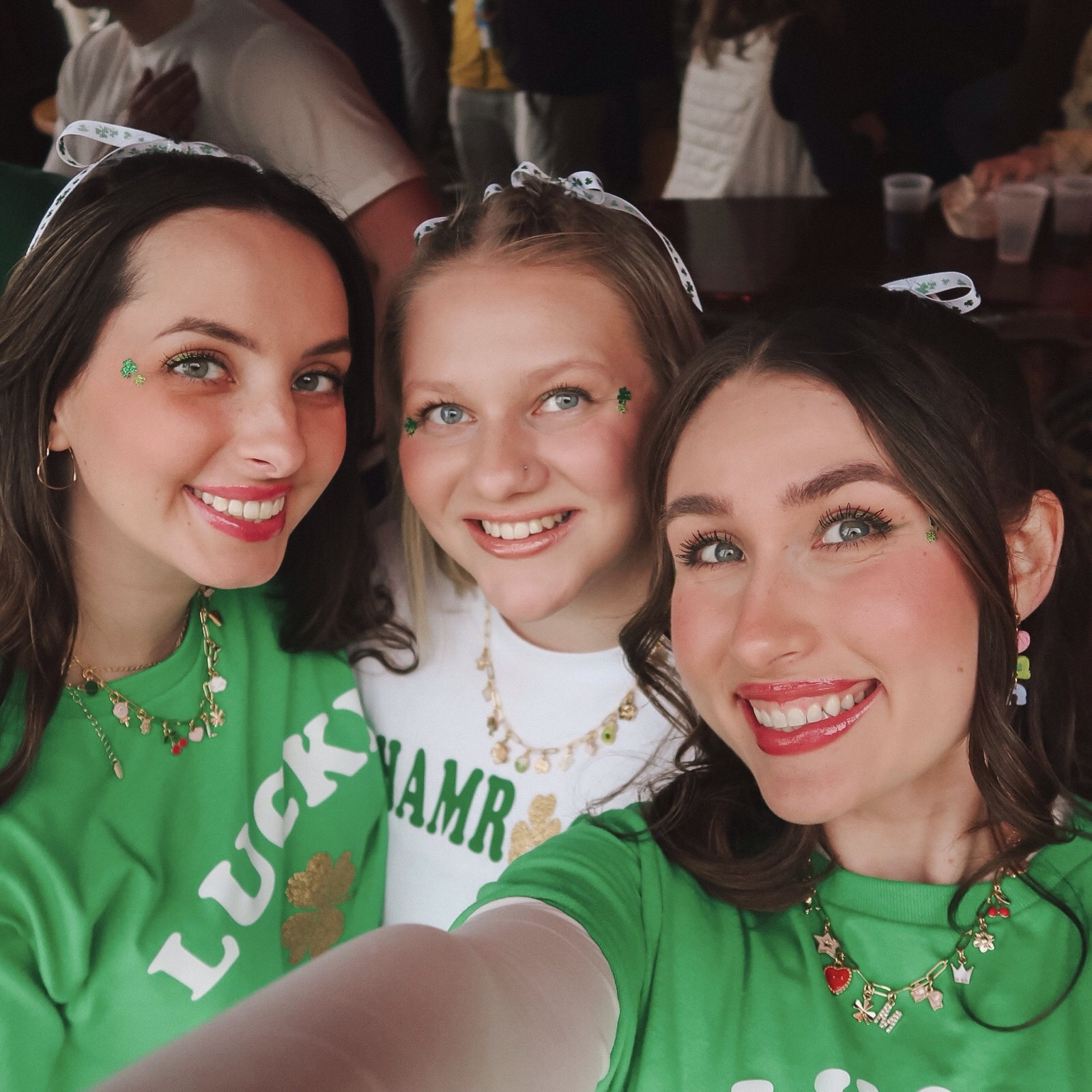 St Patrick’s Day Outfit! 🌈🍀💕

•we had so much fun making our shirts & charm necklaces! They were perfect for all of the St. Paddy’s day festivities!

•Shirts: Gildan Cotten t-shirts in Irish Green :) with gold sparkly, white, and green iron-on vinyl. To stay warm I layered my PUMIEY white crew neck longsleeve

•Charm necklace: PAVOI (my fav jewelry brand) 14k gold paper clip style necklace with the best charm pack I could find! 
—> charms are so expensive so this was a great affordable option and we thought they were great quality with tons of cute options for everyone!

•Lip: trusty Tarte Maracuja juicy up balm in raspberry 

•Jeans: (my favs) Abercrombie curve love high 90s relaxed jeans size 26L in light

•Shoes: converse platform high tops in white leather (PERFECT for cleaning up after bars or darties) 

•Nails: Beetles gel nail polish

•Liner: (SO FUN) we all wore ColourPop chrome BFF crème gel liner in Wild Idea (metallic lime green with shifts of true green to teal)

#stpatricksday #stpatricksdayoutfit
#stpaddiesdayinspo

#LTKsalealert #LTKparties #LTKstyletip