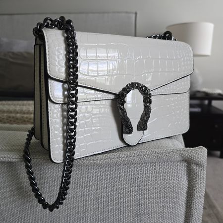 Gorgeous designer look alike shoulder bag from Amazon. Purse, shoulder bag, designer look alike purse, white purse, snakeskin purse, summer bag

#LTKfindsunder50 #LTKitbag #LTKstyletip