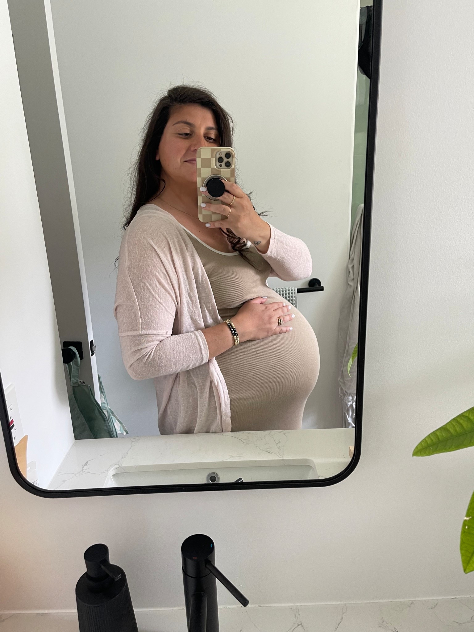 The softest, coziest tank dress. It’s not maternity and my true size large was huge, so I grabbed the medium. Definitely size down even with a bump!

#LTKStyleTip #LTKMidsize #LTKBump